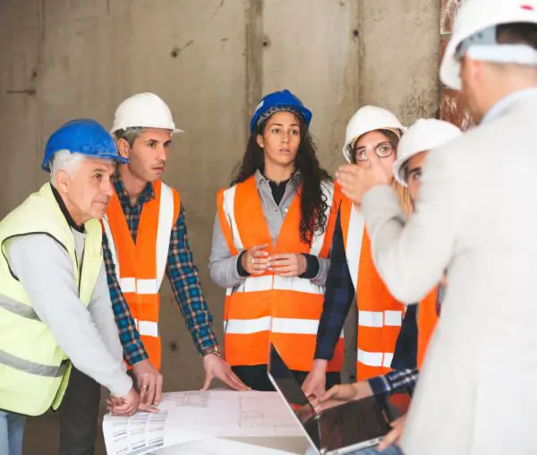 Construction team discussing project plans.