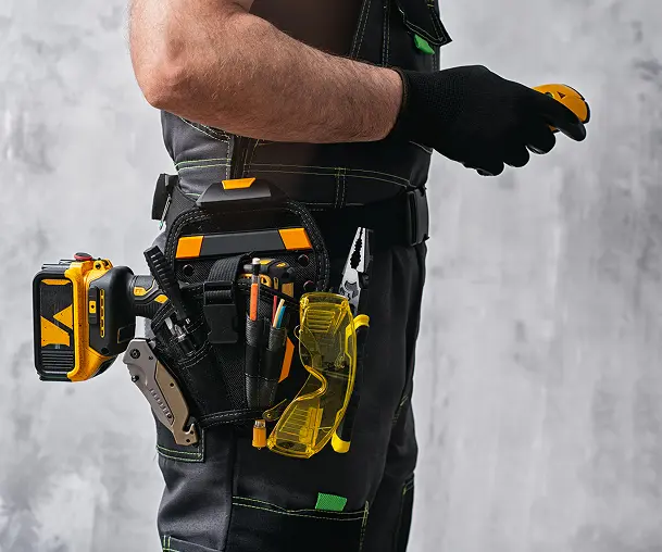 Worker wearing gloves and safety gear