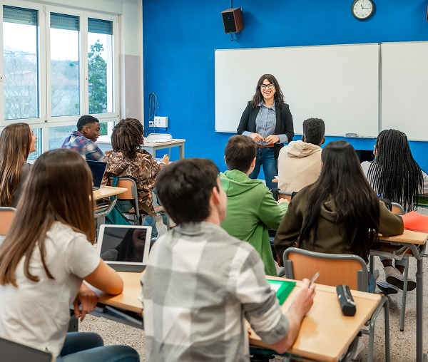 Students listening to a teacher